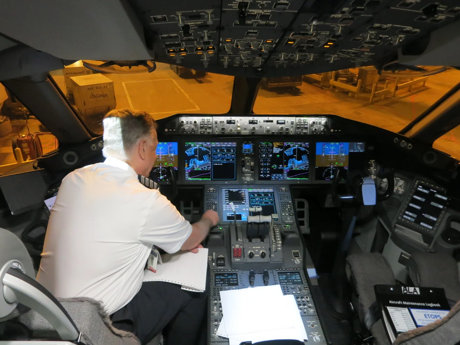 American Airlines pilot working in the cockpit