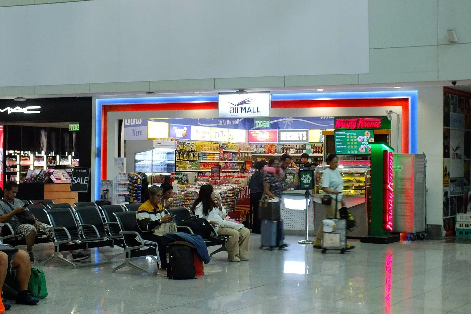 Shops and seating in the departure area at NAIA Terminal 3 in Pasay